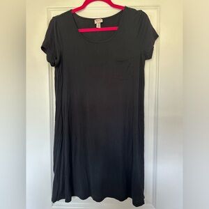 Black T Shirt Dress with Pocket Detail. Size medium.